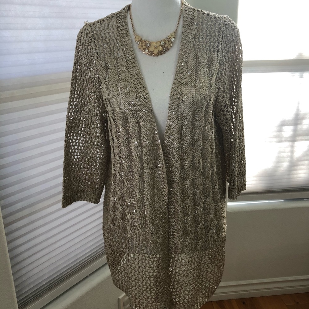 Lauren Michelle Champagne knitted sweater.